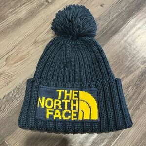 Navy North Face toque with pom pom